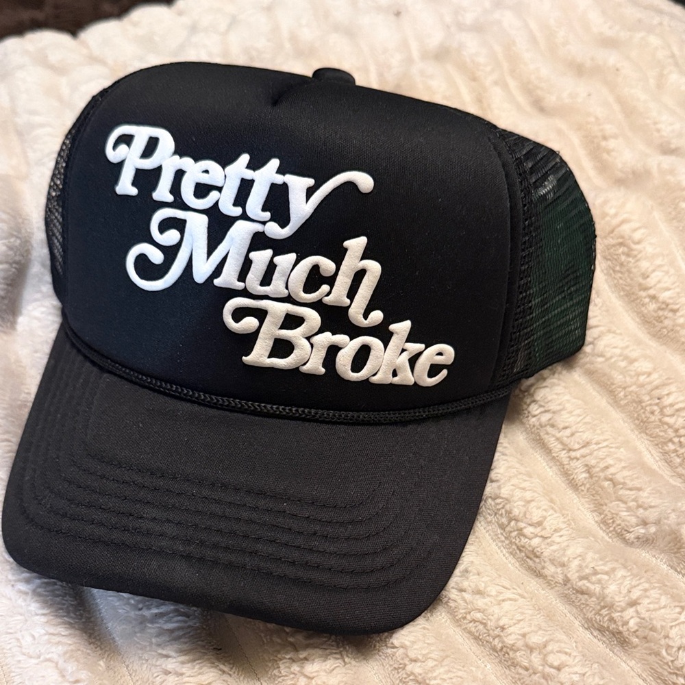 Black Mesh Trucker Hat with White 'APTHCRY' Embroidery